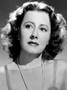 How tall is Irene Dunne?